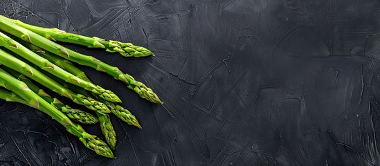 Wall Mural - Heap of asparagus isolated Fresh vegetables top view. Copy space image. Place for adding text and design