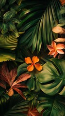 Wall Mural - Tropical background with variety of exotic plants forming a lush natural texture