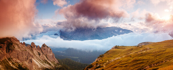 Poster - Mountainous terrain with a rocky massif in the Italian Alps in the early morning. South Tyrol, Europe.