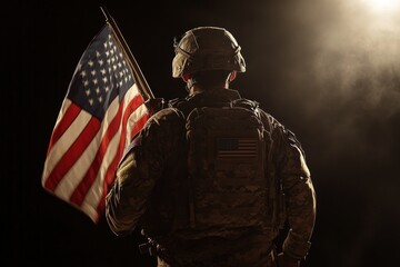 A Soldier Holding an American Flag in the Dark