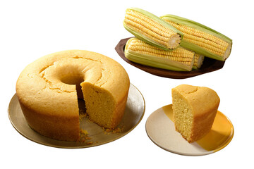 Wall Mural - Corn cake on a plate, slice removed, corn cobs