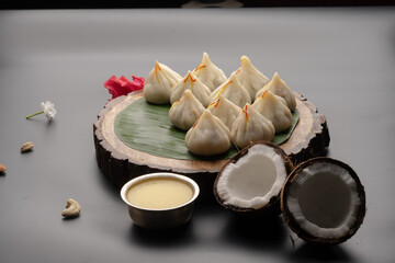 Steamed Modak, white modak, ukdiche modak made from rice flour and coconut jaggery filling. Modak is a traditional Indian sweet made during Ganesh Utsav