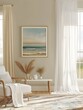 © Boss Architectura  - Mockup Frame in Cozy Farmhouse Living Room with Impressionist Seascape and Billowing Sheer Curtains  The space features soft blended color hues a plush area rug