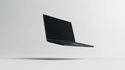 Black Laptop Floating In Mid-Air Against A White Background