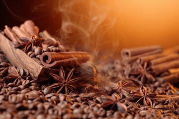 Wall Mural - Steaming coffee beans with cinnamon sticks, anise, and nutmeg.