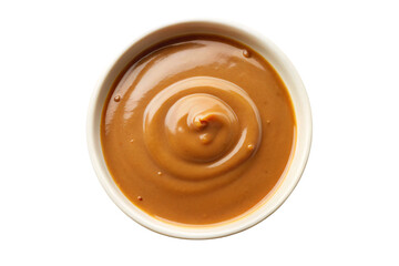 A bowl of smooth, creamy brown sauce with a glossy texture, swirled neatly in the center, ready to complement savory dishes, on a transparent background