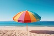 © Oratai - A large, round beach umbrella with a solid color pattern positioned on a pristine beach