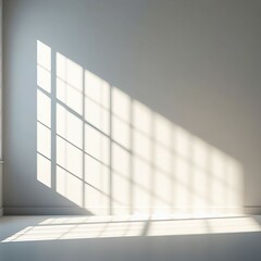 Canvas Print - Sunlit window shadow casting geometric pattern on wall