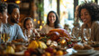 © Diffin - A Thanksgiving table filled with festive dishes, with a beautifully roasted turkey at the center, surrounded by family members enjoying the holiday meal.