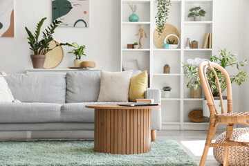 Sticker - Interior of light living room with sofa, table and houseplants