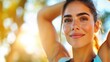 © LifeMedia - A radiant image of a young woman smiling and stretching outdoors, enjoying the fresh air and natural light, symbolizing happiness, health, and a positive, active lifestyle.