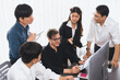 © InfiniteFlow - Group of diverse office worker employee working together on strategic business marketing planning in corporate office room. Positive teamwork in business workplace concept. Prudent