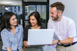 © kanpisut - Businessmans crew working with new startup project in modern Office. Group of diverse businesspeople working together around a meeting table in an office