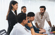 © Summit Art Creations - Group of diverse office worker employee working together on strategic business marketing planning in corporate office room. Positive teamwork in business workplace concept. Prudent