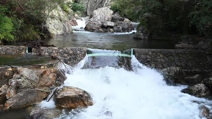 Wall Mural - Waterfall in Ribeira de Alges, in Portugal