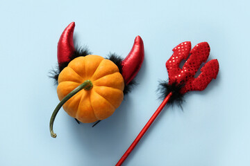 Wall Mural - Pumpkin with Halloween decor on color background