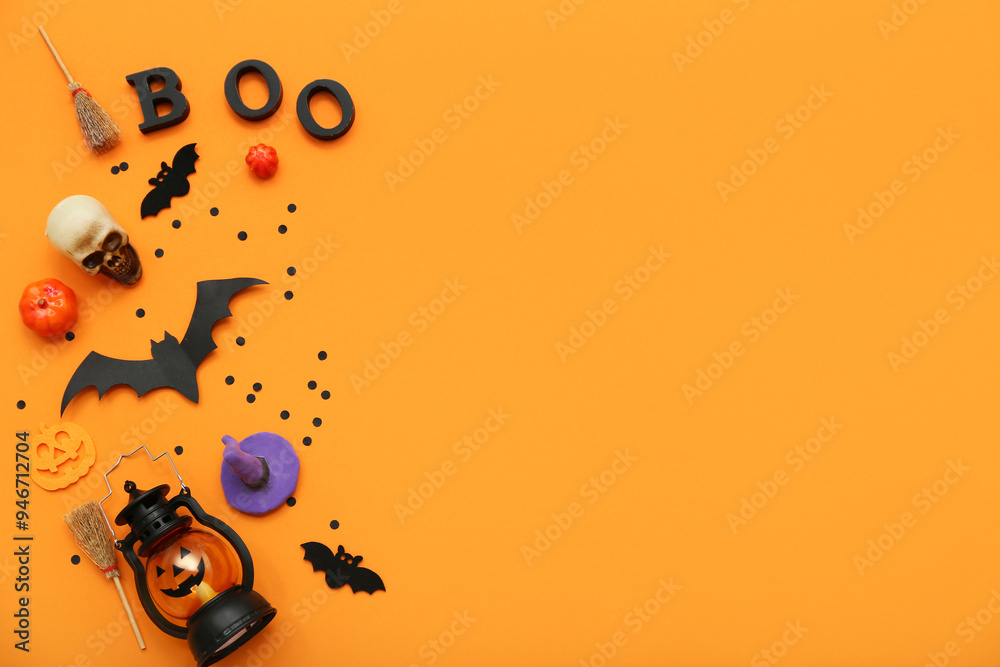 Composition with different decorations for Halloween on orange background