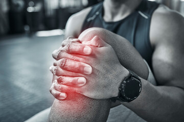 Wall Mural - Fitness, person and hands for knee pain on gym floor of wrong workout technique, injury recovery exercise and tendinitis. Man, red glow and muscle ache of strain on leg, training and osteoporosis.