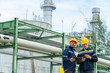 © CandyRetriever  - Male petrochemical engineers teamwork meeting discussion at petroleum oil refinery industry area. Industrial factory technician worker working maintenance inspect manufacturing energy power gas system