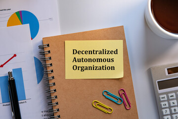 Poster - There is sticky note with the word Decentralized Autonomous Organization. It is as an eye-catching image.