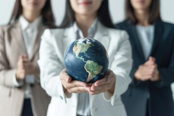 Poster - A woman holds a globe in her hands, symbolizing exploration and adventure