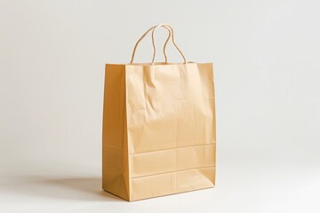 Wall Mural - A lone brown paper bag sits on a clean white surface, simple and unassuming