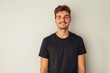 © Fotograf - A happy man wearing a black shirt and smiling, suitable for use in social media posts or advertising