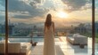 © visoot - An Asian woman in a white gown standing on a large, modern, minimalist balcony at home, gazing at the distant city. The balcony is furnished with outdoor sofa. Generative AI.