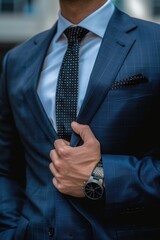 Poster - A close-up of a man wearing a formal suit and tie, perfect for business or professional uses