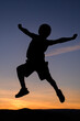 © Ahna - silhouette of jumping person