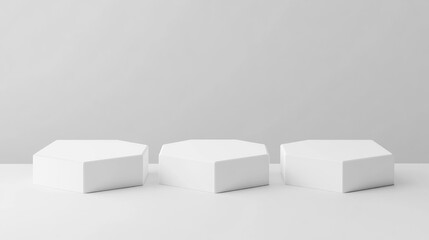 Poster - Three blank white hexagon pedestals with a white background 3D illustration for product presentation mock up