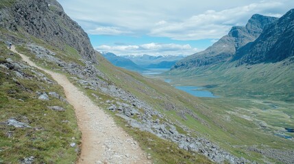 Wall Mural - Hiking Trail Through Mountain Valley Landscape with Cloudy Sky