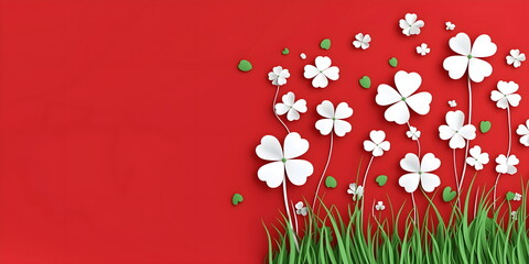 Whimsical white paper cut clovers and grass on bright red background. Cheerful St. Patrick's Day for festive party invitations or spring season announcements. Place for text