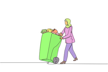 Poster - single continuous line drawing arabian businesswoman pushing trash can filled with wads of paper. pi