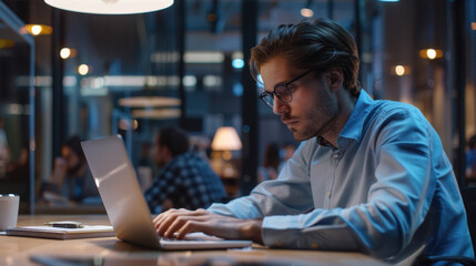 Poster - The businessman working on laptop.