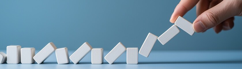 Poster - A set of dominoes lined up with labels for various startup risks and rewards, where a hand is about to push the first one, symbolizing the cascading effects of venture capital decisions. The