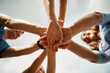 © StarDweller/peopleimages.com - Below, hands and people in circle for support, synergy and trust in nature for growth. Team building, volunteers and outdoor with gesture for cleaning, cooperation and collaboration in environment