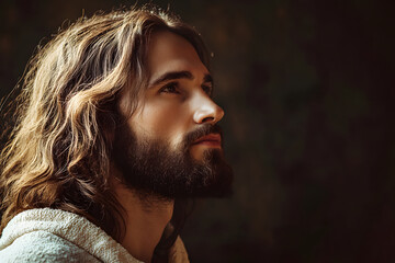 Side view of Jesus with a dramatic background