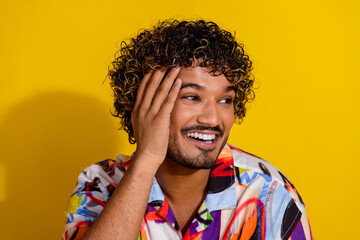 Sticker - Photo of nice young man laugh look empty space wear shirt isolated on yellow color background