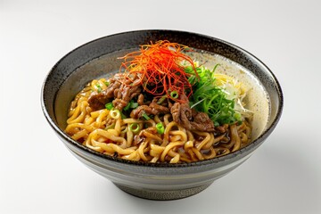 Delicious bowl of beef udon noodles garnished with fresh scallions and chili threads served in a traditional ceramic dish