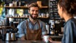 © Thavesak - Cheerful Barista with Warm Smile Serving Coffee in Modern CafÃ© with Friendly Interaction