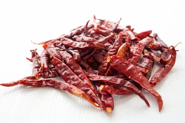 Wall Mural - Dried chili pile on white background