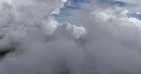 Wall Mural - The breathtaking sky filled with lovely white clouds was captured in Baguio, Philippines.