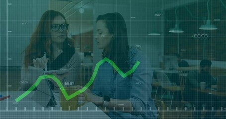 Wall Mural - Business growth chart animation over two women discussing work in modern office