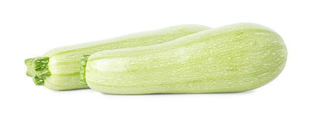 Two fresh ripe zucchinis isolated on white