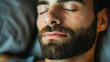© PRASANNAPIX - Man with closed eyes enjoying a moment of calm and relaxation.