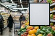 © fabioderby - Blank sign is displayed in a grocery store near fresh fruits and vegetables