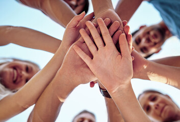 Canvas Print - Happy, people and hands together closeup outdoor with motivation, support and friends from below in summer. Social, park and party with group huddle to show solidarity, trust and bonding with care