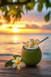 © Joyce - Tasty coconut drink with straw in hot tropical summer at sunset beach
