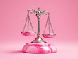 © weerasak - A stylish pink balance scale on a marble base, symbolizing justice and equality in a modern design.